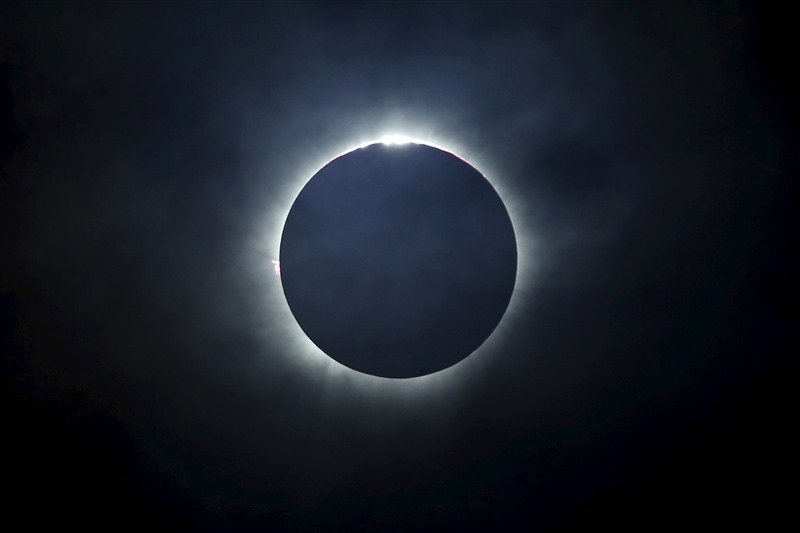 A diamond ring solar eclipse is seen from Matantimali, Palu, Central Sulawesi, Indonesia, India. Solar Eclipse,Solar Eclipse 2016,partial solar eclipse,Partial solar eclipse in India,Solar eclipse in India,solar eclipse in IndiIndonesia,solar eclipse around worls,Solar Eclipse rare pics,Solar Eclipse rare images,Solar Eclipse rare stills,Solar Eclips