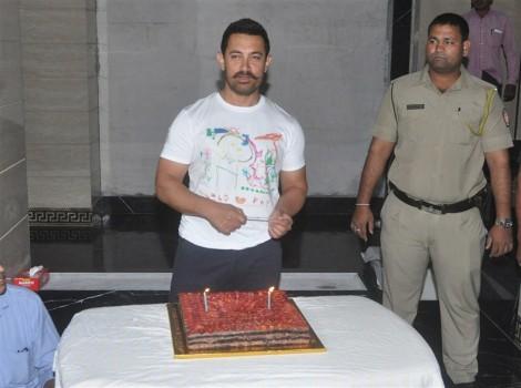 Bollywood actor Aamir Khan's 51st birthday celebrations with media.
