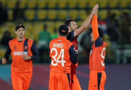 The Netherlands prevailed over Ireland by 12 runs in a six over-per-side rain-curtailed inconsequential qualifying contest of the World Twenty20 cricket tournament at the Himachal Pradesh Cricket Association (HPCA) Stadium on Sunday.