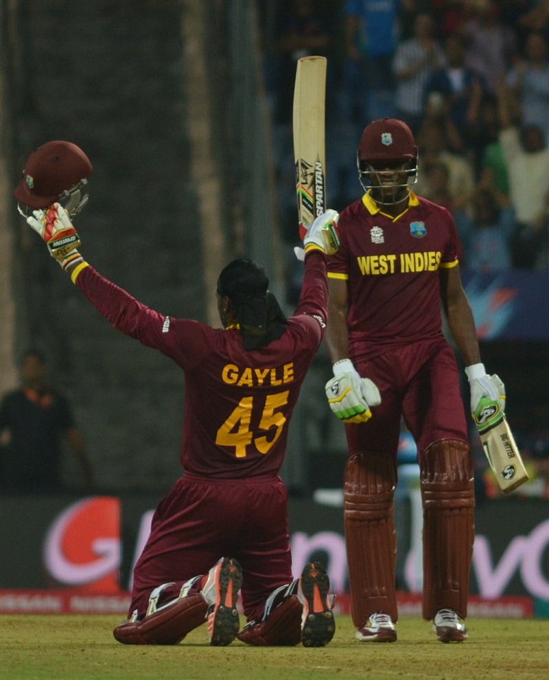 Swashbuckling West Indian batsman Chris Gayle blasted an unbeaten 100 in just 48 balls to steer his side to a comfortable six wicket victory against England in their Group 1 World Twenty20 cricket clash at the Wankhede Stadium on Wednesday. Chris Gayle,Chris Gayle hits hundred,Chris Gayle hammers England with century,Chris Gayle hammers England,Chris Gayle hits 2nd World T20 hundred,Chris Gayle struck a rapid century,Chris Gayle rapid century,Chris Gayle century