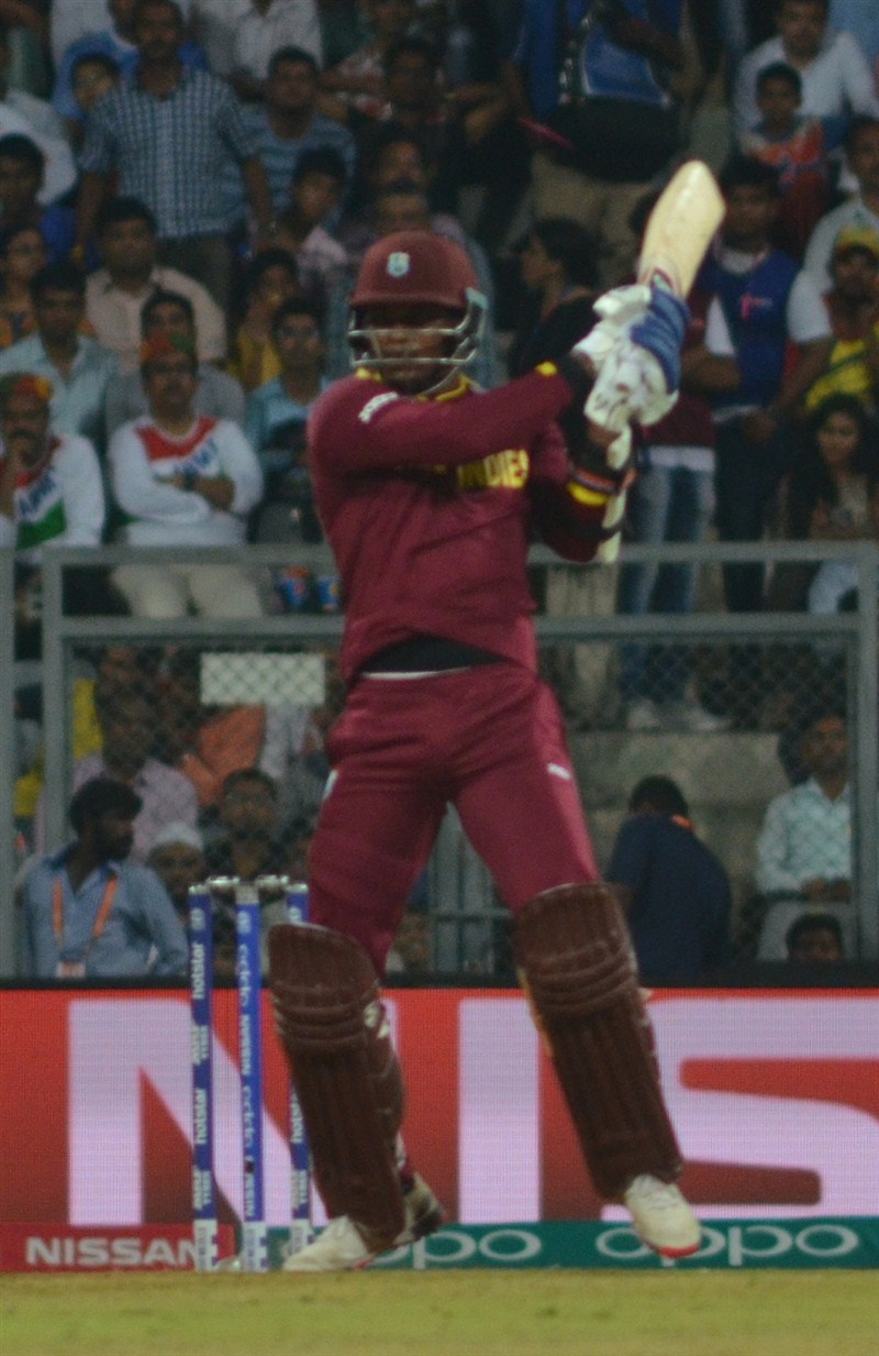 Swashbuckling West Indian batsman Chris Gayle blasted an unbeaten 100 in just 48 balls to steer his side to a comfortable six wicket victory against England in their Group 1 World Twenty20 cricket clash at the Wankhede Stadium on Wednesday. Chris Gayle,Chris Gayle hits hundred,Chris Gayle hammers England with century,Chris Gayle hammers England,Chris Gayle hits 2nd World T20 hundred,Chris Gayle struck a rapid century,Chris Gayle rapid century,Chris Gayle century