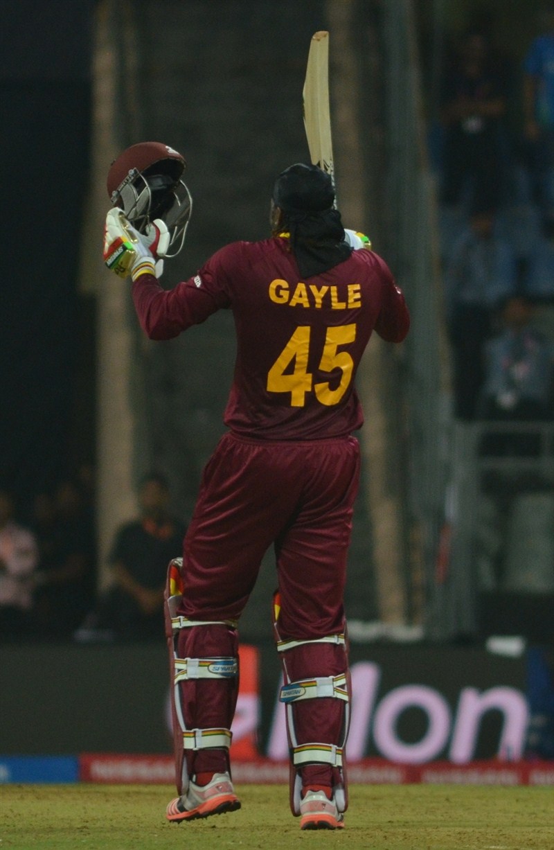Swashbuckling West Indian batsman Chris Gayle blasted an unbeaten 100 in just 48 balls to steer his side to a comfortable six wicket victory against England in their Group 1 World Twenty20 cricket clash at the Wankhede Stadium on Wednesday. Chris Gayle,Chris Gayle hits hundred,Chris Gayle hammers England with century,Chris Gayle hammers England,Chris Gayle hits 2nd World T20 hundred,Chris Gayle struck a rapid century,Chris Gayle rapid century,Chris Gayle century