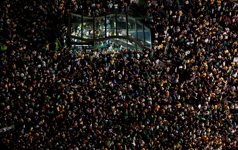 Protests erupted in several Brazilian cities on Wednesday after President Dilma Rousseff named her predecessor Luiz Inacio Lula da Silva chief of staff and a taped conversation fed opposition claims the move was meant to shield Lula from prosecution. Brazilians protest after Lula,Brazilians protest,President Dilma Rousseff,Luiz Inacio Lula da Silva,5,000 demonstrators,demonstrators,Congress building,Anti-government