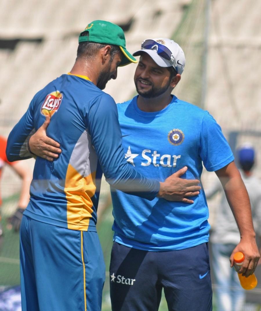 Suresh Raina and Ajinkya Rahane during a practice session at Eden Gardens ahead of their ICC T20 World Cup match in Kolkata, on March 17, 2016. India vs Pakistan,India v Pakistan,Pakistan vs India,Pakistan v India,India vs Pakistan World T20,Suresh Raina,Ajinkya Rahane,ICC T20 World Cup match,ICC World T20 2016,ICC World T20,India vs Pakistan in ICC World T20 2016,India vs Pakistan ICC World T20