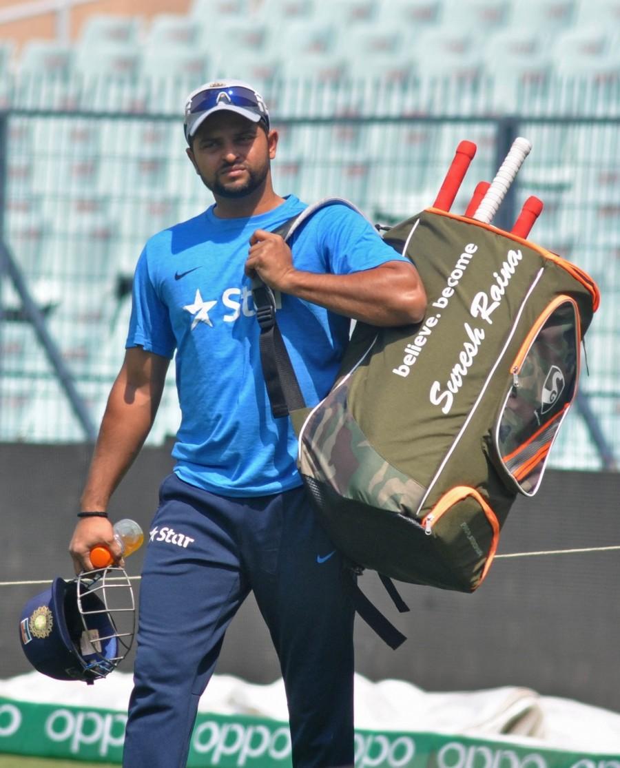 Suresh Raina and Ajinkya Rahane during a practice session at Eden Gardens ahead of their ICC T20 World Cup match in Kolkata, on March 17, 2016. India vs Pakistan,India v Pakistan,Pakistan vs India,Pakistan v India,India vs Pakistan World T20,Suresh Raina,Ajinkya Rahane,ICC T20 World Cup match,ICC World T20 2016,ICC World T20,India vs Pakistan in ICC World T20 2016,India vs Pakistan ICC World T20