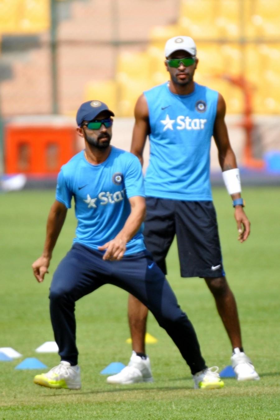 Indian Cricket Players during a practice session ahead of match against Bangladesh at Chinnaswamy Stadium, in Bengaluru on March 22, 2016. India-Bangladesh,India vs Bangladesh,India v Bangladesh,Virat Kohli,MS Dhoni,Yuvraj Singh,World T20,ICC World T20 2016,ICC World T20,World T20 2016,World T20 pics,World T20 images,World T20 stills,World T20 pictures