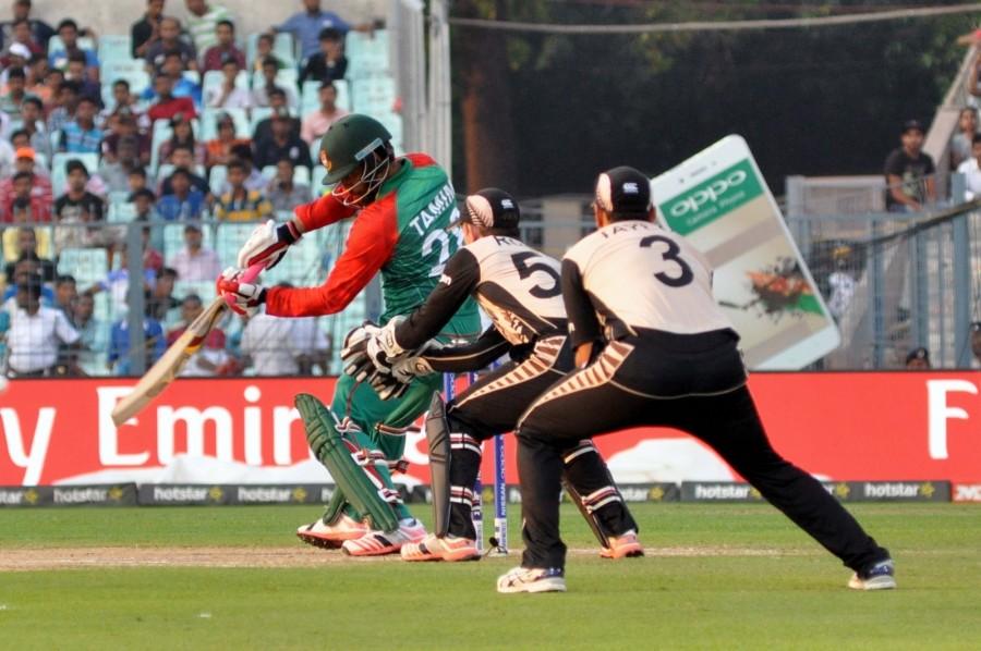 New Zealand put on an impressive show with the ball to skittle out Bangladesh for 70 in 15.4 overs to notch a 75-run win in a floodlight malfunction-interrupted World Twenty20 Group 2 encounter at the Eden Gardens on Saturday. New Zealand beat Bangladesh,New Zealand vs Bangladesh,New Zealand v Bangladesh,New Zealand in Semis,World T20,ICC World T20 2016,World T20 pics,World T20 images,World T20 stills,World T20 pictures