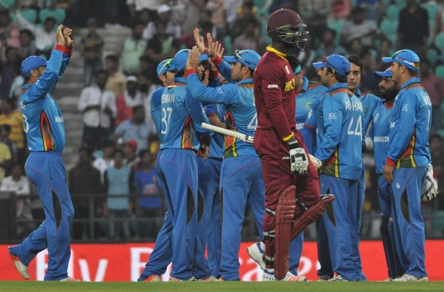 Aghanistan ended their impressive World Twenty20 campaign with a bang, upsetting the West Indies by six runs in a group phase match at the Vidarbha Cricket Association (VCA) Stadium on Sunday. Afghanistan shock Windies,Afghanistan beats Windies,Afghanistan vs Windies,Afghanistan v Windies,WT20,WT20 2016,icc wt20 2016,WT20 pics,WT20 images,WT20 photos,WT20 pictures