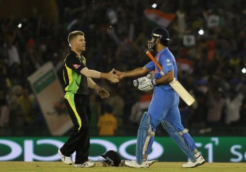 Virat Kohli led the way with a sublime half-century as India defeated Australia by six wickets at the Punjab Cricket Association Stadium here on Sunday to enter the World Twenty20 semi-finals.