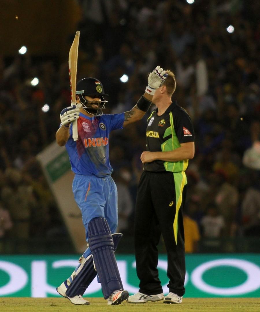 Virat Kohli led the way with a sublime half-century as India defeated Australia by six wickets at the Punjab Cricket Association Stadium here on Sunday to enter the World Twenty20 semi-finals. India beat Australia,India vs Australia,India v Australia,India enter World T20 semis,India World T20 semis,World T20 semis,World T20,World T20 2016,India vs Australia pics,India vs Australia images,India vs Australia stills,India vs Australia pictures