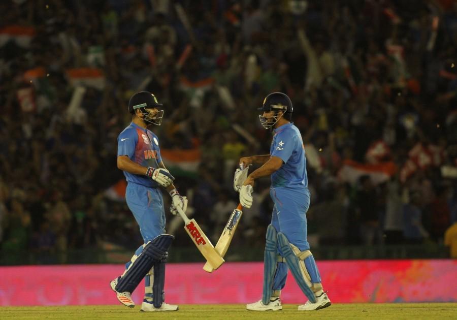 Virat Kohli led the way with a sublime half-century as India defeated Australia by six wickets at the Punjab Cricket Association Stadium here on Sunday to enter the World Twenty20 semi-finals. India beat Australia,India vs Australia,India v Australia,India enter World T20 semis,India World T20 semis,World T20 semis,World T20,World T20 2016,India vs Australia pics,India vs Australia images,India vs Australia stills,India vs Australia pictures