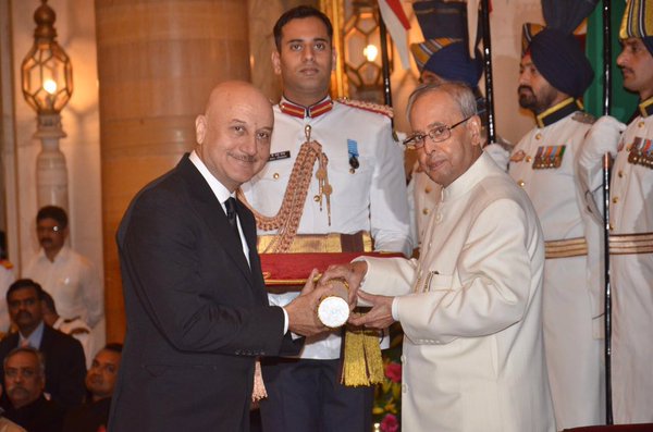 President Pranab Mukherjee on Monday conferred Padma awards on 56 eminent personalities, including Dhirubhai Ambani (posthumously), actor Anupam Kher and former Comptroller and Auditor General of India Vinod Rai, at a function at Rashtrapati Bhavan. Padma Awards 2016,Padma Awards,Ajay Devgn,Anupam Kher,Madhur Bhandarkar,Dhirubhai Ambani,Vinod Rai,Padma Awards event,President Pranab Mukherjee,Pranab Mukherjee,Modi,Narendra Modi