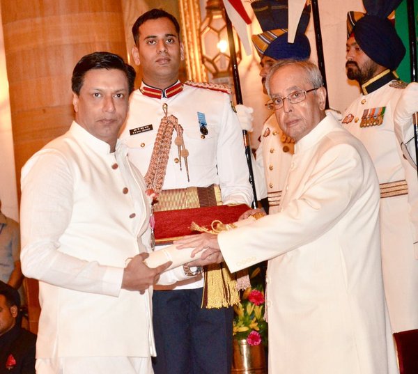 President Pranab Mukherjee on Monday conferred Padma awards on 56 eminent personalities, including Dhirubhai Ambani (posthumously), actor Anupam Kher and former Comptroller and Auditor General of India Vinod Rai, at a function at Rashtrapati Bhavan. Padma Awards 2016,Padma Awards,Ajay Devgn,Anupam Kher,Madhur Bhandarkar,Dhirubhai Ambani,Vinod Rai,Padma Awards event,President Pranab Mukherjee,Pranab Mukherjee,Modi,Narendra Modi