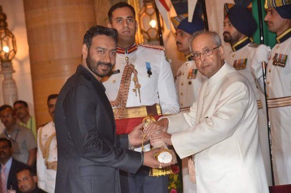 President Pranab Mukherjee on Monday conferred Padma awards on 56 eminent personalities, including Dhirubhai Ambani (posthumously), actor Anupam Kher and former Comptroller and Auditor General of India Vinod Rai, at a function at Rashtrapati Bhavan. Padma Awards 2016,Padma Awards,Ajay Devgn,Anupam Kher,Madhur Bhandarkar,Dhirubhai Ambani,Vinod Rai,Padma Awards event,President Pranab Mukherjee,Pranab Mukherjee,Modi,Narendra Modi
