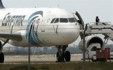 A man thought to be strapped with explosives hijacked an Egyptian plane on a flight between Alexandria and Cairo on Tuesday and forced it to land in Cyprus, Egyptian officials said.