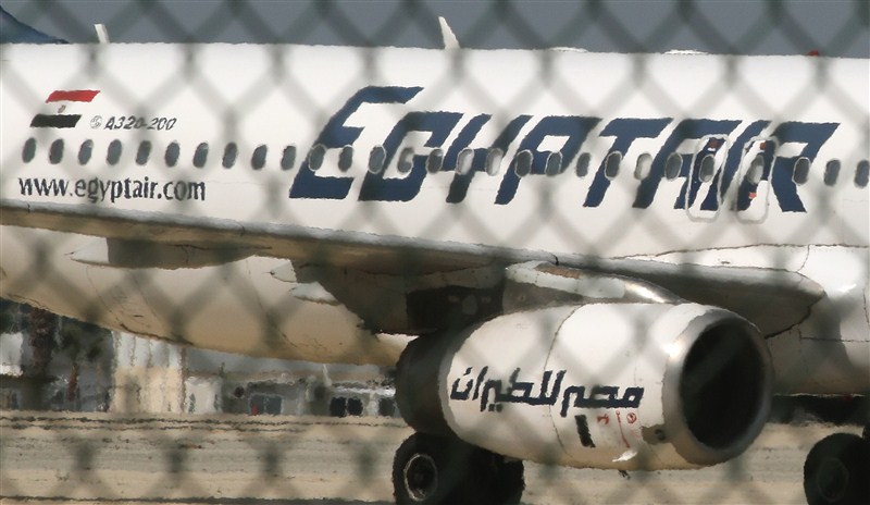 A man thought to be strapped with explosives hijacked an Egyptian plane on a flight between Alexandria and Cairo on Tuesday and forced it to land in Cyprus, Egyptian officials said. EgyptAir,EgyptAir plane hijacked,EgyptAir flight MS181,EgyptAir flight hijacked,explosives,Cyprus,EgyptAir plane landed at Larnaca airport,EgyptAir MS181,MS181,Cypriot anti-terrorism