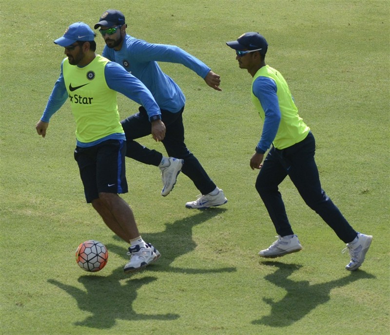 Indian cricketers during a practice session ahead of their WT20 semi-final match against West Indies at Wankhede Stadium in Mumbai on March 30, 2016. India vs West Indies,India vs West Indies World T20 Semi Final,India vs West Indies Semi Final,India vs West Indies World T20,WT20 semi-final,Wankhede Stadium,Virat Kohli,MS Dhoni,practice session