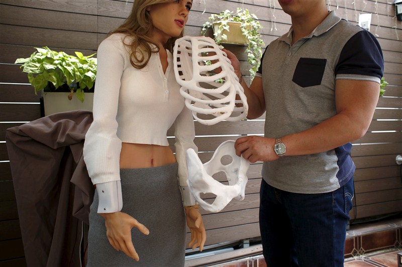 Product and graphic designer Ricky Ma, 42, explains the face and colour tracking functions of his life-size robot 'Mark 1', modelled after a Hollywood star, in Hong Kong, China March 31, 2016. Graphic designer Ricky Ma,Ricky Ma,Mark 1,Mark 1 robot,robot,Hollywood star robot