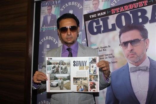 Bollywood's 'bad man' Gulshan Grover unveils latest cover of Stardust magazine.