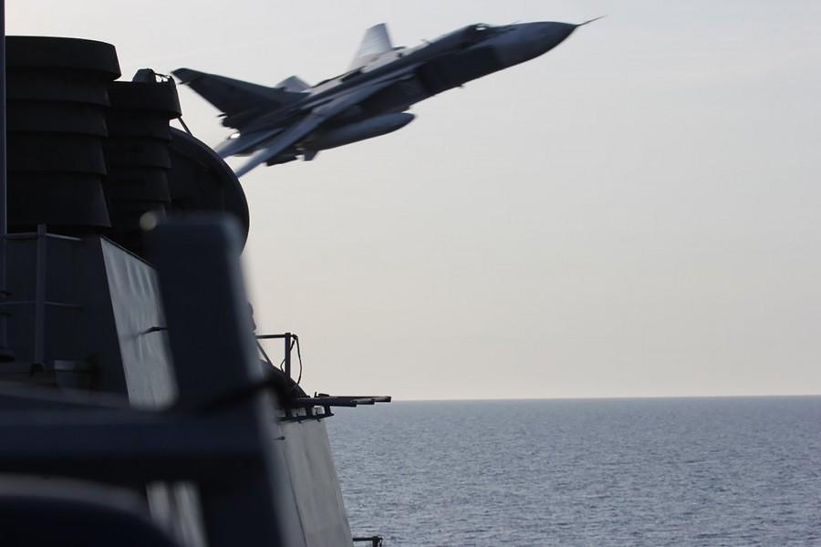 Two Russian warplanes flew simulated attack passes near a U.S. guided missile destroyer in the Baltic Sea, the U.S. military said, with one official describing them as one of the most aggressive interactions in recent memory. Russian jets fly,Russian jets fly over U.S Ship,Two Russian warplanes,Russian warplanes,warplanes,U.S. military