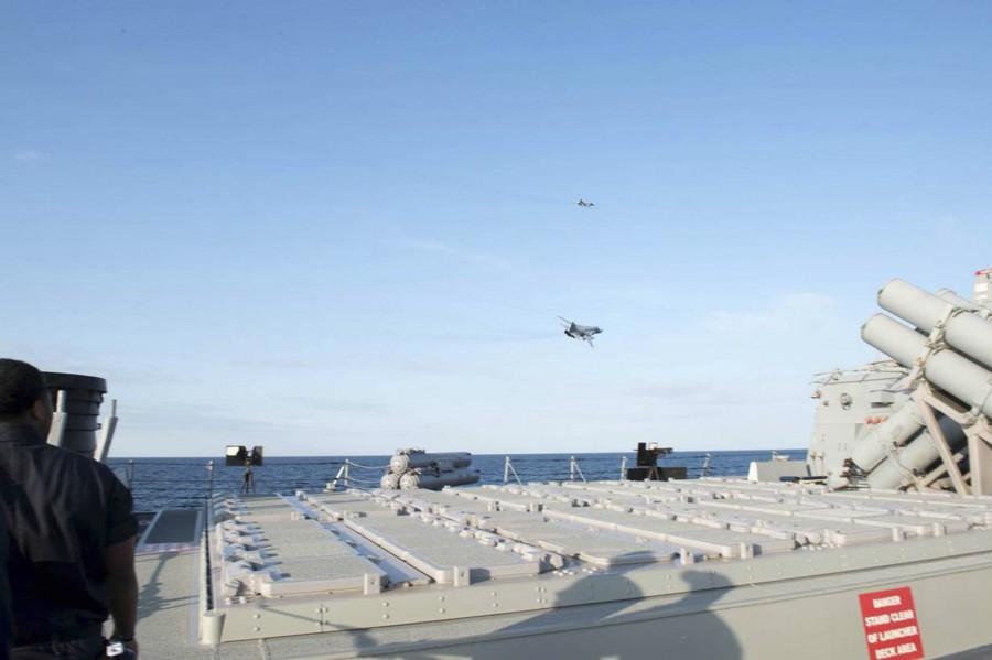 Two Russian warplanes flew simulated attack passes near a U.S. guided missile destroyer in the Baltic Sea, the U.S. military said, with one official describing them as one of the most aggressive interactions in recent memory. Russian jets fly,Russian jets fly over U.S Ship,Two Russian warplanes,Russian warplanes,warplanes,U.S. military