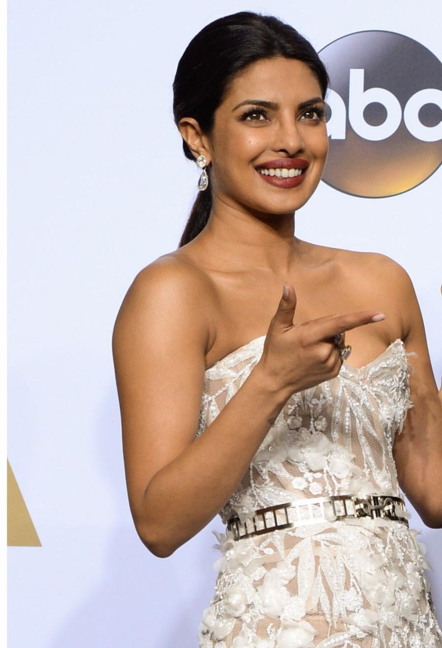 Bollywood actress Priyanka Chopra has made India proud once again. Her name has been featured in Time magazine's 100 Most Influential People in the World list alongside Oscar-winner Leonardo DiCaprio, Facebook founder and CEO Mark Zuckerberg, and singer Nicki Minaj, among others. Priyanka Chopra,Priyanka Chopra in Time's list,Priyanka Chopra in Time's list of 100 Most Influential People,Priyanka Chopra the Most Influential People,actress Priyanka Chopra,Priyanka Chopra pics,Priyanka Chopra images,Priyanka Chopra photos,P
