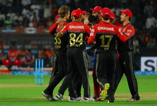 Star batsmen A.B. de Villiers and Virat Kohli smashed quick-fire half-centuries followed by a disciplined bowling effort which guided Royal Challengers Bangalore to a comfortable 13-run victory over Rising Pune Supergiants in an Indian Premier League (IPL) contest on Friday.