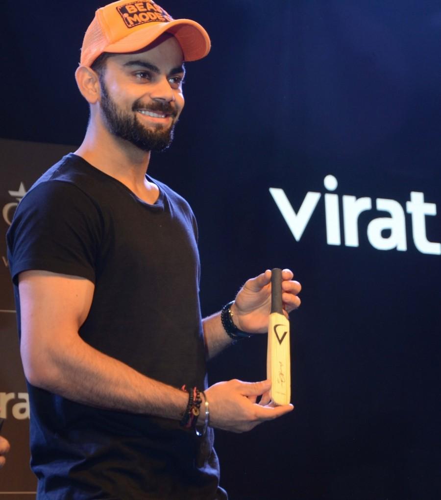 Indian Cricketer Virat Kohli at the launch of Virat Kohli,VIrat Fan Box,Virat Kohli at the launch of 'VIrat Fan Box',Virat Kohli launches VIrat Fan Box,Indian Cricketer Virat Kohli,Cricket player Virat Kohli,actress Virat Kohli,Virat Kohli pics,Virat Kohli images,Virat Kohli stills,Virat Ko