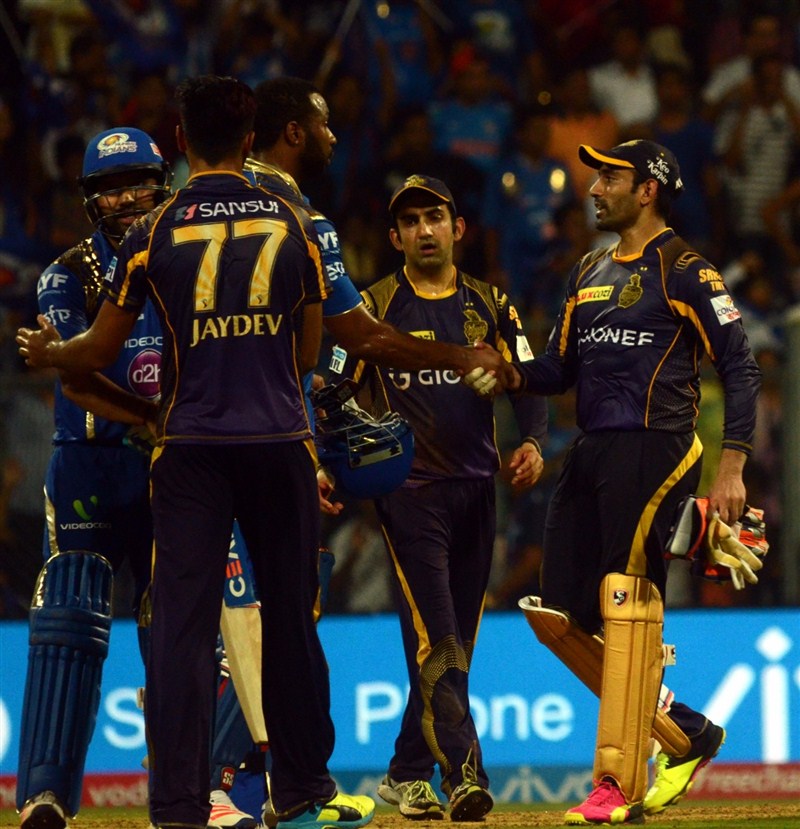 Riding on skipper Rohit Sharma's unbeaten 68 alongside Kieron Pollard's quickfire 17-ball 51, defending champions Mumbai Indians outclassed Kolkata Knight Riders by six wickets in an Indian Premier League (IPL) cricket match at the Wankhede Stadium on Thursday. Mumbai Indians,Kolkata Knight Riders,Mumbai Indians beat Kolkata Knight Riders by 6 wickets,Mumbai Indians beat Kolkata Knight Riders,Rohit Sharma,Kieron Pollard,Indian Premier League,Indian Premier League 2016,Indian Premier League 9,IPL 2016,IPL pics,IP