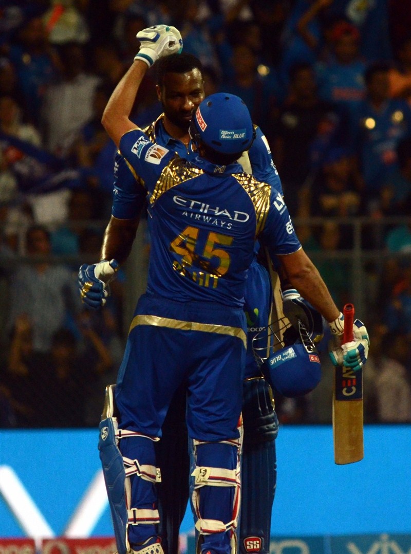 Riding on skipper Rohit Sharma's unbeaten 68 alongside Kieron Pollard's quickfire 17-ball 51, defending champions Mumbai Indians outclassed Kolkata Knight Riders by six wickets in an Indian Premier League (IPL) cricket match at the Wankhede Stadium on Thursday. Mumbai Indians,Kolkata Knight Riders,Mumbai Indians beat Kolkata Knight Riders by 6 wickets,Mumbai Indians beat Kolkata Knight Riders,Rohit Sharma,Kieron Pollard,Indian Premier League,Indian Premier League 2016,Indian Premier League 9,IPL 2016,IPL pics,IP