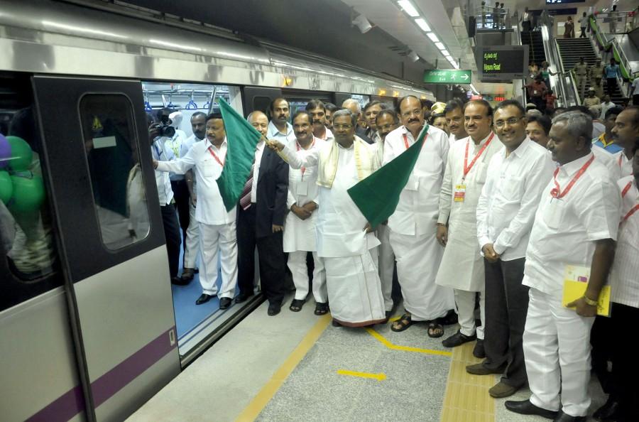 Union Urban Development Minister Venkaiah Naidu and Karnataka Chief Minister Siddaramaiah on Friday flagged-off the much awaited East-West corridor of Bangalore Metro Rail Corporation Limited (BMRCL) - south India's first underground metro. Siddaramaiah,Venkaiah Naidu,Siddaramaiah, Venkaiah Naidu flag off south India's first underground Metro,south India's first underground Metro,underground Metro,Namma Metro,Bangalore Metro Rail Corporation Limited,BMRCL
