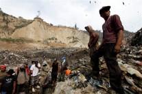 Four people are dead and at least 24 more are missing after a collapse at Guatemala City's largest garbage dump.