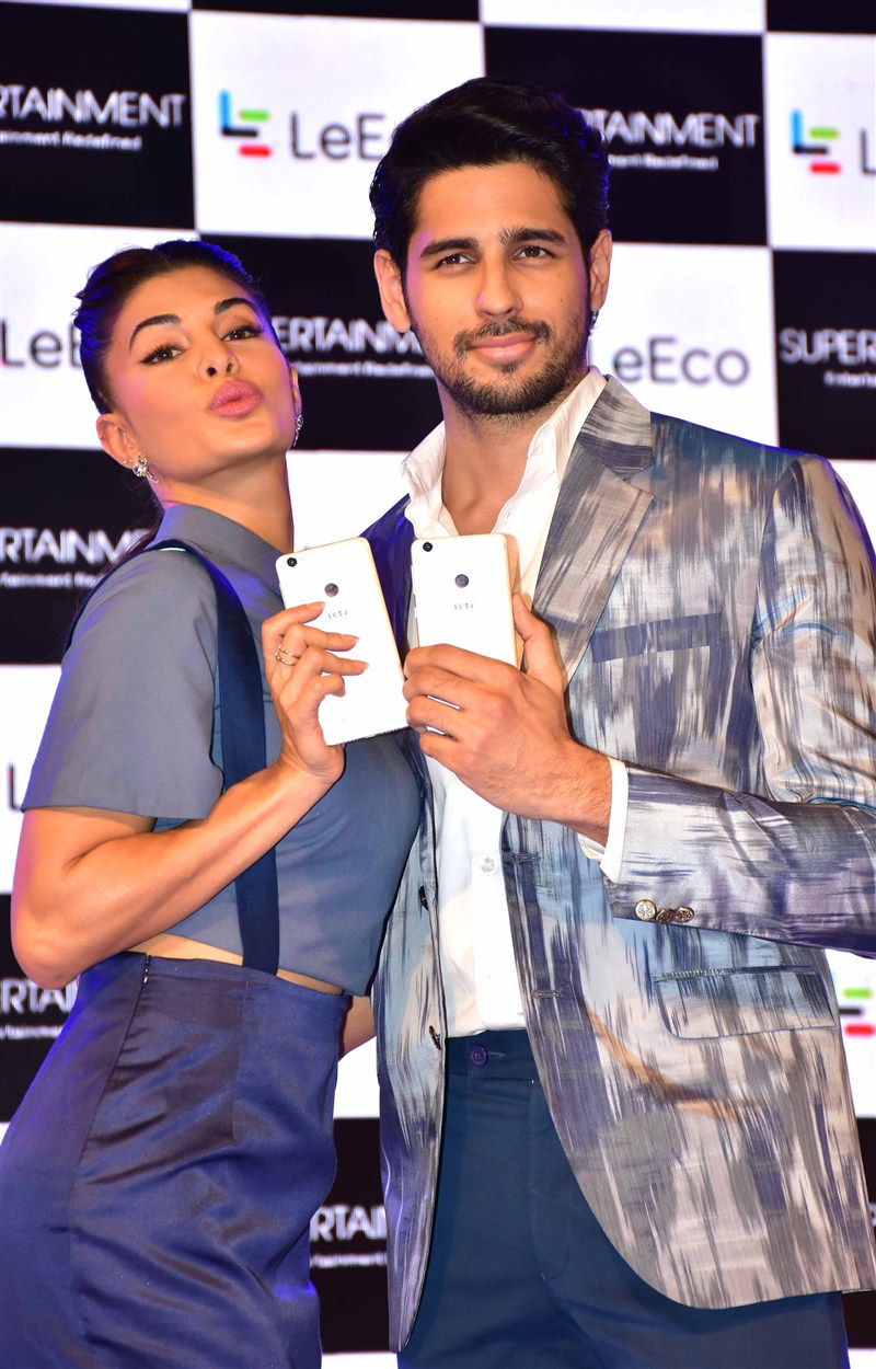 Bollywood actress Jacqueline Fernandez and actor Sidharth Malhotra during the launch of new smartphone LeEco in Mumbai. Sidharth Malhotra,Jacqueline Fernandez,LeEco's Supertainment Smartphone,LeEco's,LeEco,Sidharth Malhotra and Jacqueline Fernandez,Sidharth Malhotra & Jacqueline Fernandez,Supertainment Smartphone,Smartphone
