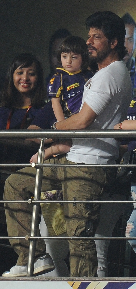 Bollywood star Shahrukh Khan waved and showered flying kisses to fans off the pitch as his team Kolkata Knight Riders (KKR) battled it out against Kings XI Punjab (KXIP) at the Eden Gardens on Wednesday. Shah Rukh Khan,AbRam,Shah Rukh Khan with son AbRam,Shah Rukh Khan and AbRam,Kolkata Knight Riders,Kings XI Punjab,Eden Gardens,Shah Rukh Khan at IPL,Shah Rukh Khan at KKR match