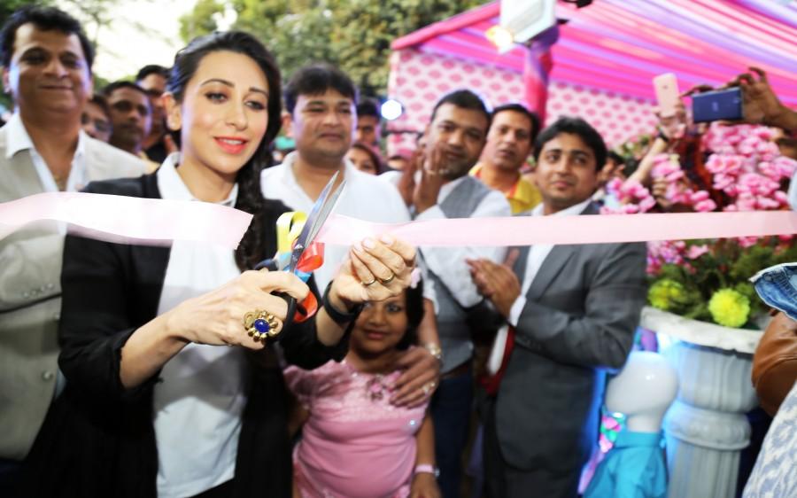 Gorgeous Karisma Kapoor with Store owners Sudhir Gupta & Manoj Khurana at the inaugural function of Western Basics Kids Wear. Karisma Kapoor,Karisma Kapoor inaugurates Western Basics Kids Wear Store,Western Basics Kids Wear Store,actress Karisma Kapoor,Karisma Kapoor latest pics,Karisma Kapoor latest images,Karisma Kapoor latest photos,Karisma Kapoor latest stills,Karisma Kapoor