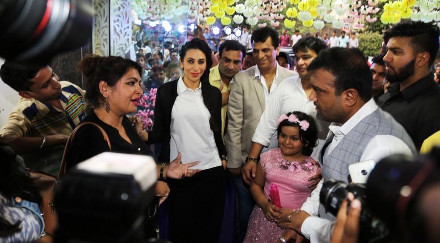 Gorgeous Karisma Kapoor with Store owners Sudhir Gupta & Manoj Khurana at the inaugural function of Western Basics Kids Wear. Karisma Kapoor,Karisma Kapoor inaugurates Western Basics Kids Wear Store,Western Basics Kids Wear Store,actress Karisma Kapoor,Karisma Kapoor latest pics,Karisma Kapoor latest images,Karisma Kapoor latest photos,Karisma Kapoor latest stills,Karisma Kapoor