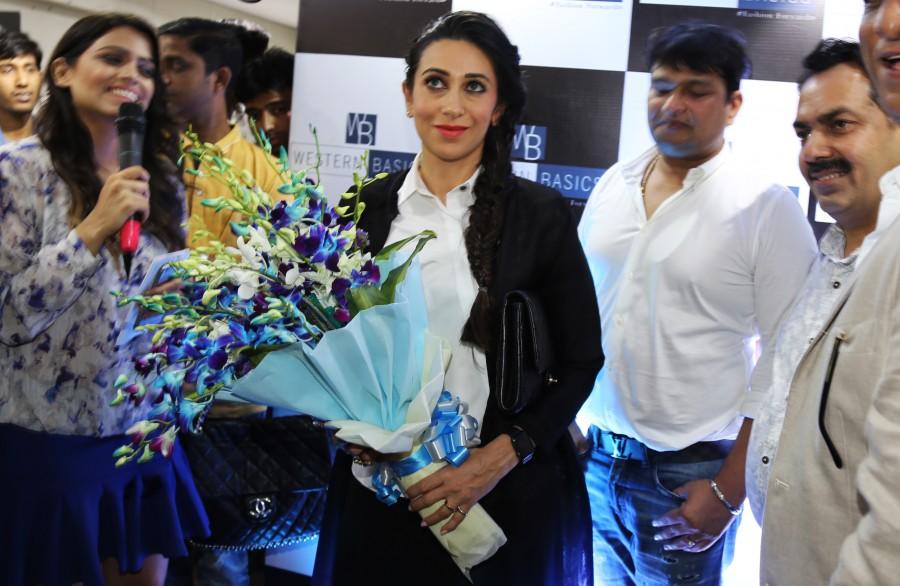 Gorgeous Karisma Kapoor with Store owners Sudhir Gupta & Manoj Khurana at the inaugural function of Western Basics Kids Wear. Karisma Kapoor,Karisma Kapoor inaugurates Western Basics Kids Wear Store,Western Basics Kids Wear Store,actress Karisma Kapoor,Karisma Kapoor latest pics,Karisma Kapoor latest images,Karisma Kapoor latest photos,Karisma Kapoor latest stills,Karisma Kapoor