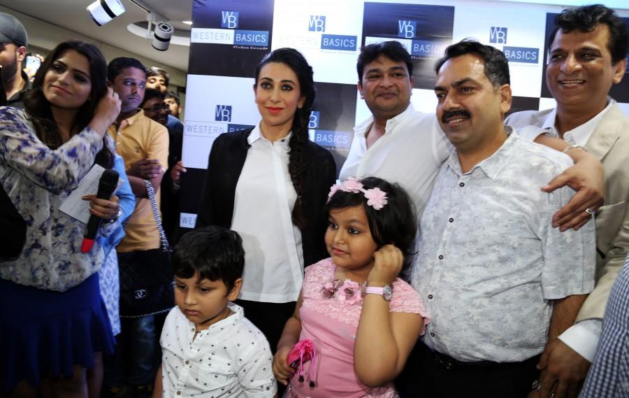 Gorgeous Karisma Kapoor with Store owners Sudhir Gupta & Manoj Khurana at the inaugural function of Western Basics Kids Wear. Karisma Kapoor,Karisma Kapoor inaugurates Western Basics Kids Wear Store,Western Basics Kids Wear Store,actress Karisma Kapoor,Karisma Kapoor latest pics,Karisma Kapoor latest images,Karisma Kapoor latest photos,Karisma Kapoor latest stills,Karisma Kapoor