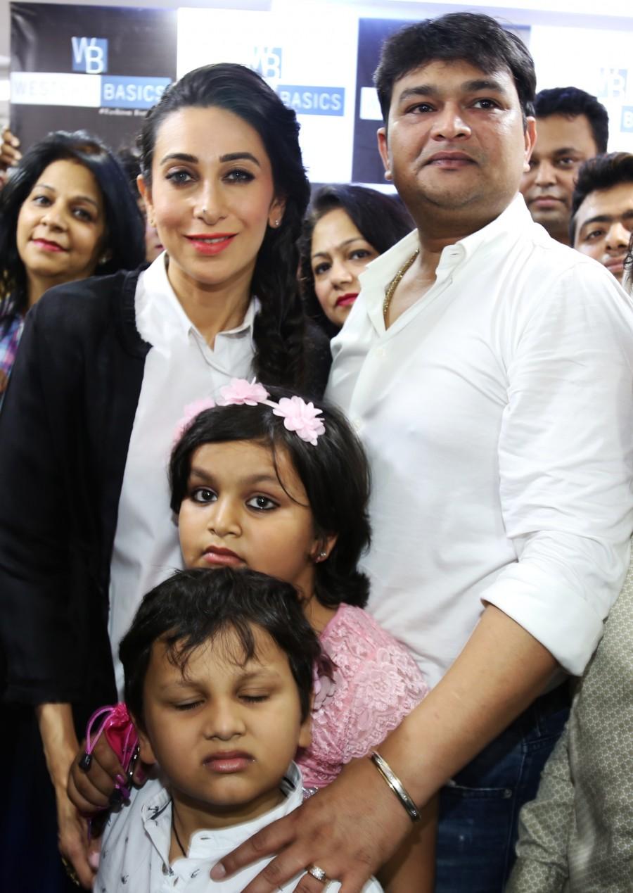 Gorgeous Karisma Kapoor with Store owners Sudhir Gupta & Manoj Khurana at the inaugural function of Western Basics Kids Wear. Karisma Kapoor,Karisma Kapoor inaugurates Western Basics Kids Wear Store,Western Basics Kids Wear Store,actress Karisma Kapoor,Karisma Kapoor latest pics,Karisma Kapoor latest images,Karisma Kapoor latest photos,Karisma Kapoor latest stills,Karisma Kapoor