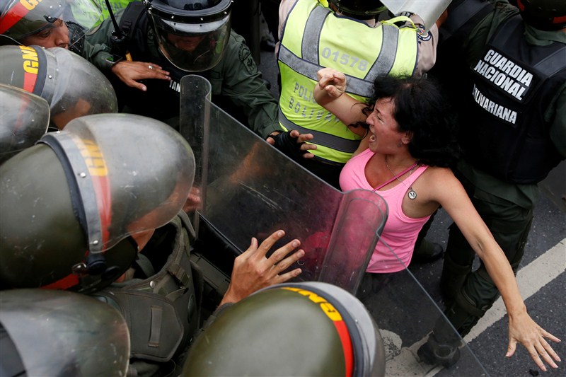 Venezuela's opposition marches to pressure a recall referendum against President Maduro. Venezuela,Opposition protests in Venezuela,protests in Venezuela,President Maduro,Venezuelan National Guards,Venezuela protest