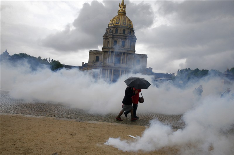 Protesters clash with police across France against plans to loosen the country's protective labor law. France revolts against labor reform,Protesters clash with police,France,France against labor reform,protective labor law,labor law