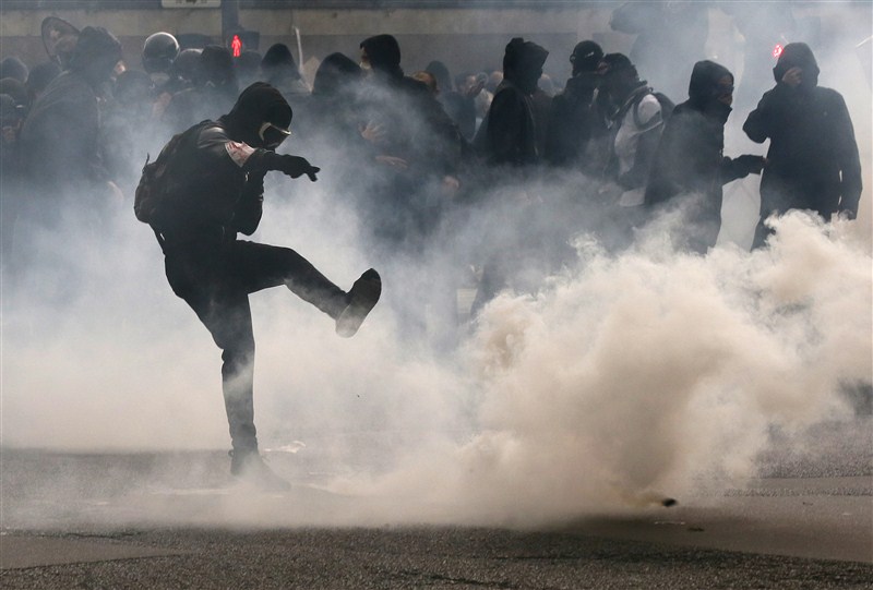 Protesters clash with police across France against plans to loosen the country's protective labor law. France revolts against labor reform,Protesters clash with police,France,France against labor reform,protective labor law,labor law