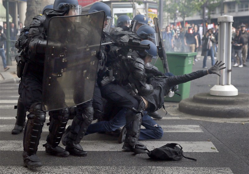 Protesters clash with police across France against plans to loosen the country's protective labor law. France revolts against labor reform,Protesters clash with police,France,France against labor reform,protective labor law,labor law