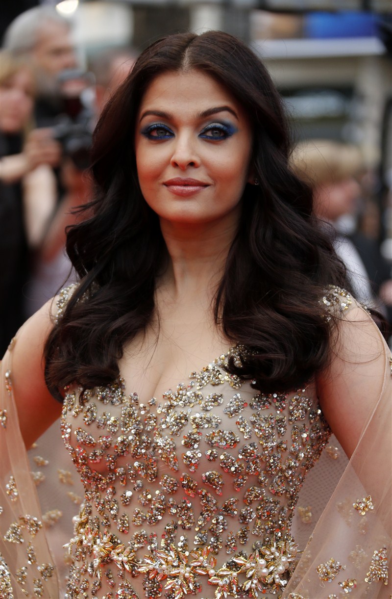 Actress Aishwarya Rai Bachchan marked her 15th year at the Cannes Film Festival with a touch of elegance and grace in a golden gown designed by Kuwait's Ali Younes. Aishwarya Rai Bachchan,Aishwarya Rai,Aishwarya Rai in golden gown,Aishwarya Rai Bachchan at Cannes Film Festival,Aishwarya Rai at Cannes Film Festival,Cannes Film Festival,Cannes Film Festival 2016,Cannes Film Festival pics,Cannes Film Festival images,Can