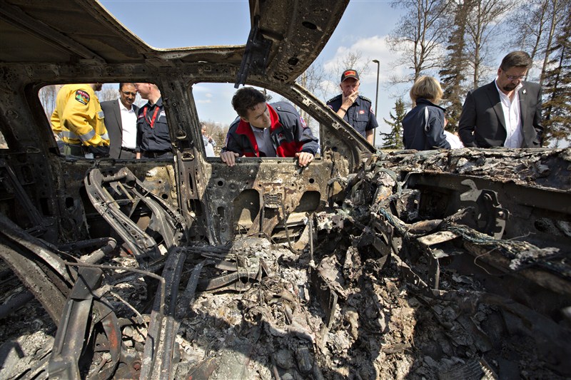 Canada's Prime Minister Justin Trudeau surveys the devastation in Fort McMurray after wildfires tore through the area. Trudeau visits Fort McMurray,Justin Trudeau,Prime Minister Justin Trudeau,Fort McMurray,Trudeau at Fort McMurray
