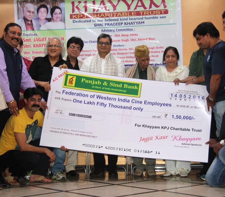 Subhash Ghai, Nitin Mukesh, Talat Aziz, Sushant Singh, Kamlesh Pandey, Dilip Pithwa, Bhupinder & Mitali Singh at an event where Khayyam Sahab and his wife Jagjit Kaur announced to donate their life earnings to FWICE for the welfare of the industry's technicians & workers. Technicians & Workers,Subhash Ghai,Nitin Mukesh,Talat Aziz,Sushant Singh,Kamlesh Pandey,Dilip Pithwa,Bhupinder,Mitali Singh,Khayyam Sahab,Jagjit Kaur