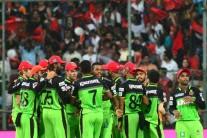 In a do-or-die match to keep their hopes alive in the Indian Premier League, Royal Challengers Bangalore (RCB) mauled Gujarat Lions (GL) by 144 runs, setting new records and sending frenzied fans into a tizzy with a double century partnership on Saturday.