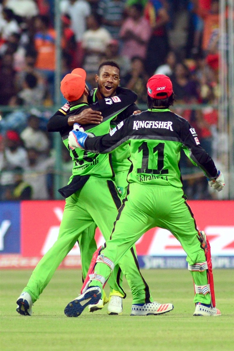 In a do-or-die match to keep their hopes alive in the Indian Premier League, Royal Challengers Bangalore (RCB) mauled Gujarat Lions (GL) by 144 runs, setting new records and sending frenzied fans into a tizzy with a double century partnership on Saturday. Royal Challengers Bangalore trash Gujarat Lions,Royal Challengers Bangalore beat Gujarat Lions,Royal Challengers Bangalore,Gujarat Lions,RCB,GL,IPL 2016,IPL pics,IPL images,IPL photos,IPL stills,IPL pictures