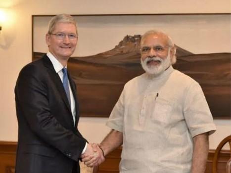 Apple CEO Tim Cook meets Narendra Modi.