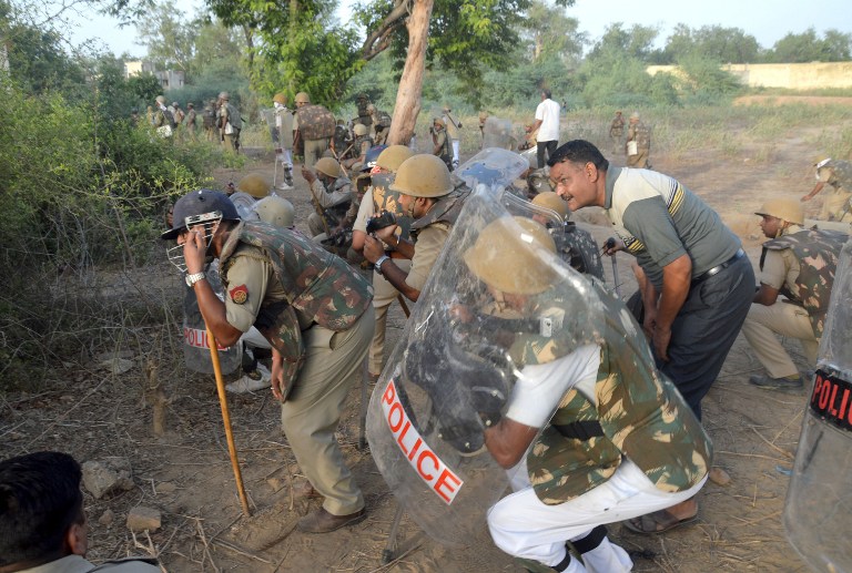 The toll in the Mathura violence rose to 20 on Friday as Superintendent of Police Mukul Dwivedi and others injured in Thursday's clash between police and encroachers during an anti-encroachment drive, succumbed to their injuries. Mathura clash,Mathura,Mathura clashes,Mathura violence,Mukul Dwivedi,Superintendent of Police Mukul Dwivedi,Samajwadi Party,Mathura clash pics,Mathura clash images,Mathura clash photos,Mathura clash stills,Mathura clash pictures